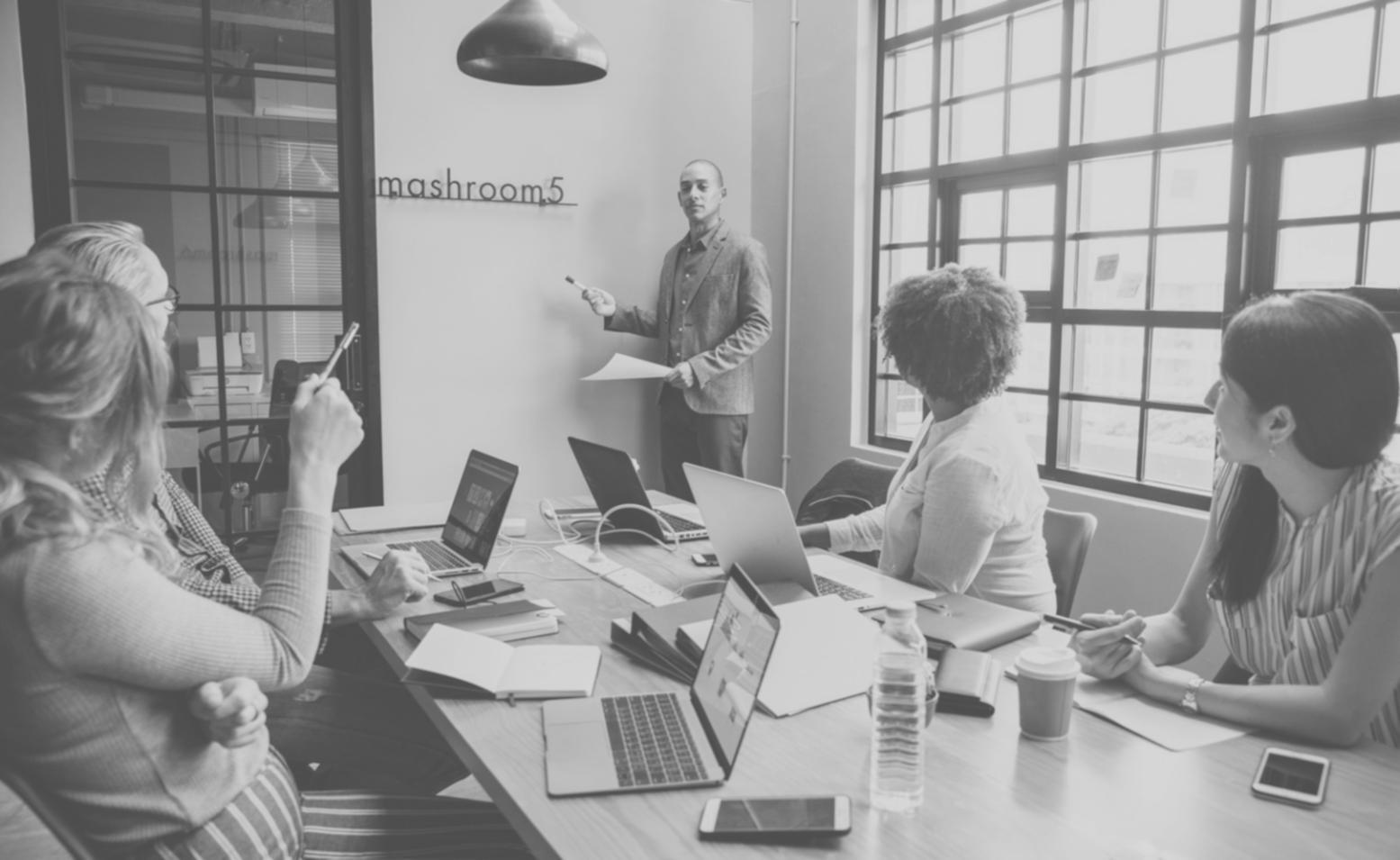 Students participating in interactive budgeting workshop with real financial scenarios